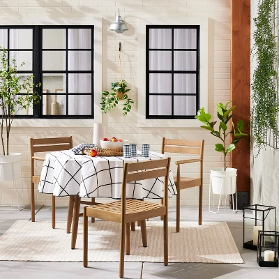 70" Grid Lines Wipeable Oil-Cloth Round Tablecloth Dark Gray/Cream - Hearth & Hand™ With Magnolia 1 70" Grid Lines Wipeable Oil-Cloth Round Tablecloth Dark Gray/Cream - Hearth & Hand™ With Magnolia